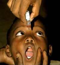 A small child receiving an oral polio vaccine in Ethiopia